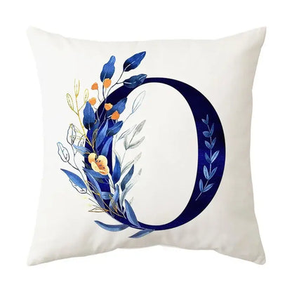Cream-colored cushion with navy blue alphabet flower letter d featuring decorbites blue alphabet design for bedroom decor