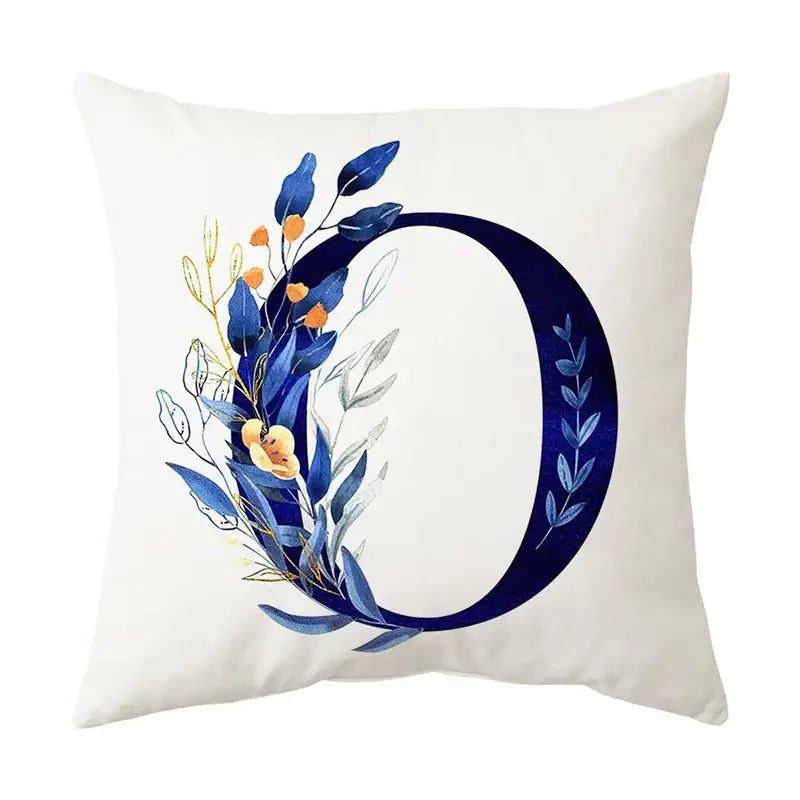 Cream-colored cushion with navy blue alphabet flower letter d featuring decorbites blue alphabet design for bedroom decor