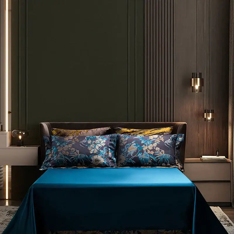 Vibrant teal satin bed sheet with matching floral jacquard egyptian cotton pillowcases in navy blue 1500tc bedding set