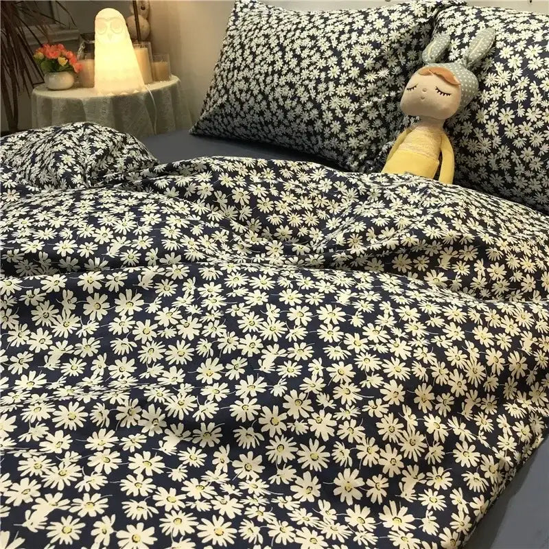Navy blue and white daisy cartoon printed bedding set featuring a cute cartoon printed duvet cover with dense white daisies