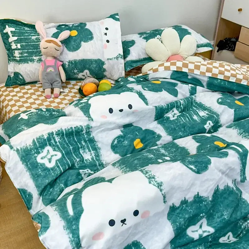 Navy blue and white daisy cartoon printed bedding set with green and white cute cartoon printed quilt featuring bunny faces on soft fabric