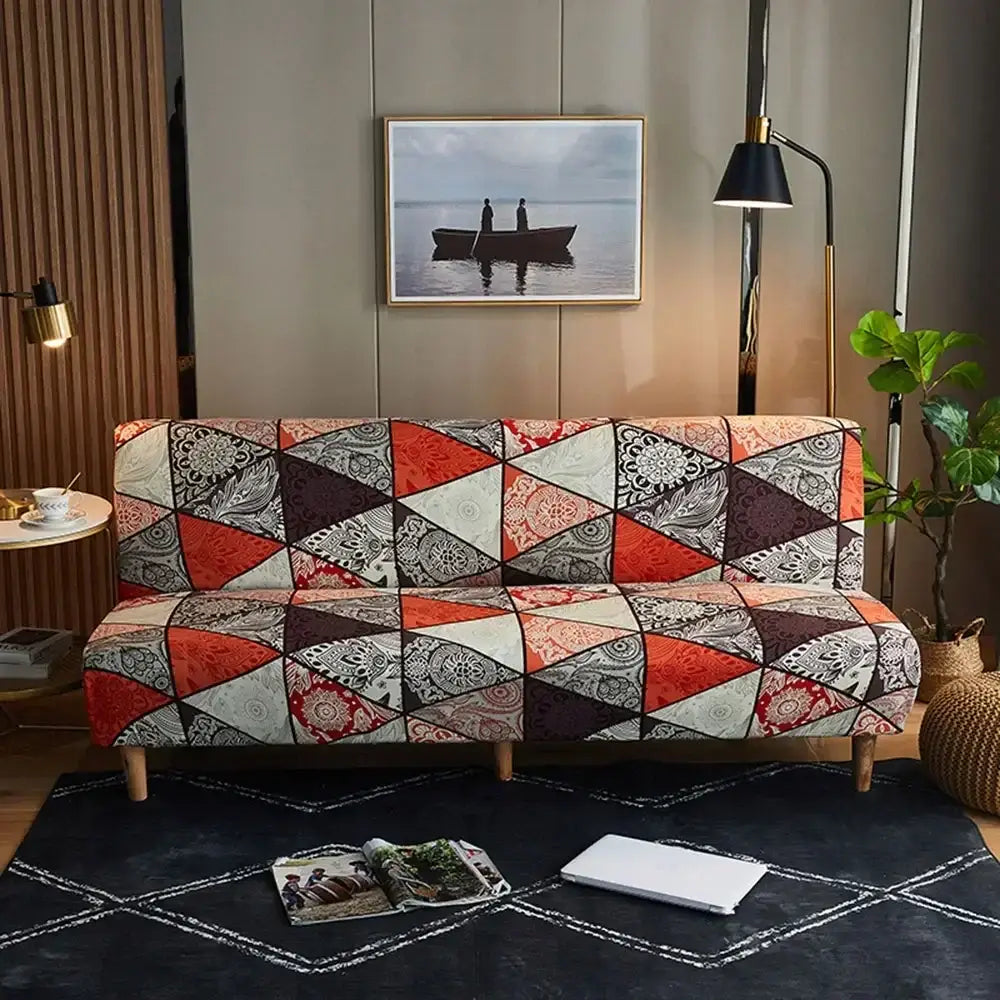 A vibrant patchwork sofa cover with red beige and dark brown geometric patterns and floral embroidery for decorbites bohemian mandala futon