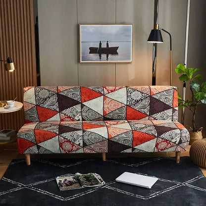 A vibrant patchwork sofa cover with red beige and dark brown geometric patterns and floral embroidery for decorbites bohemian mandala futon