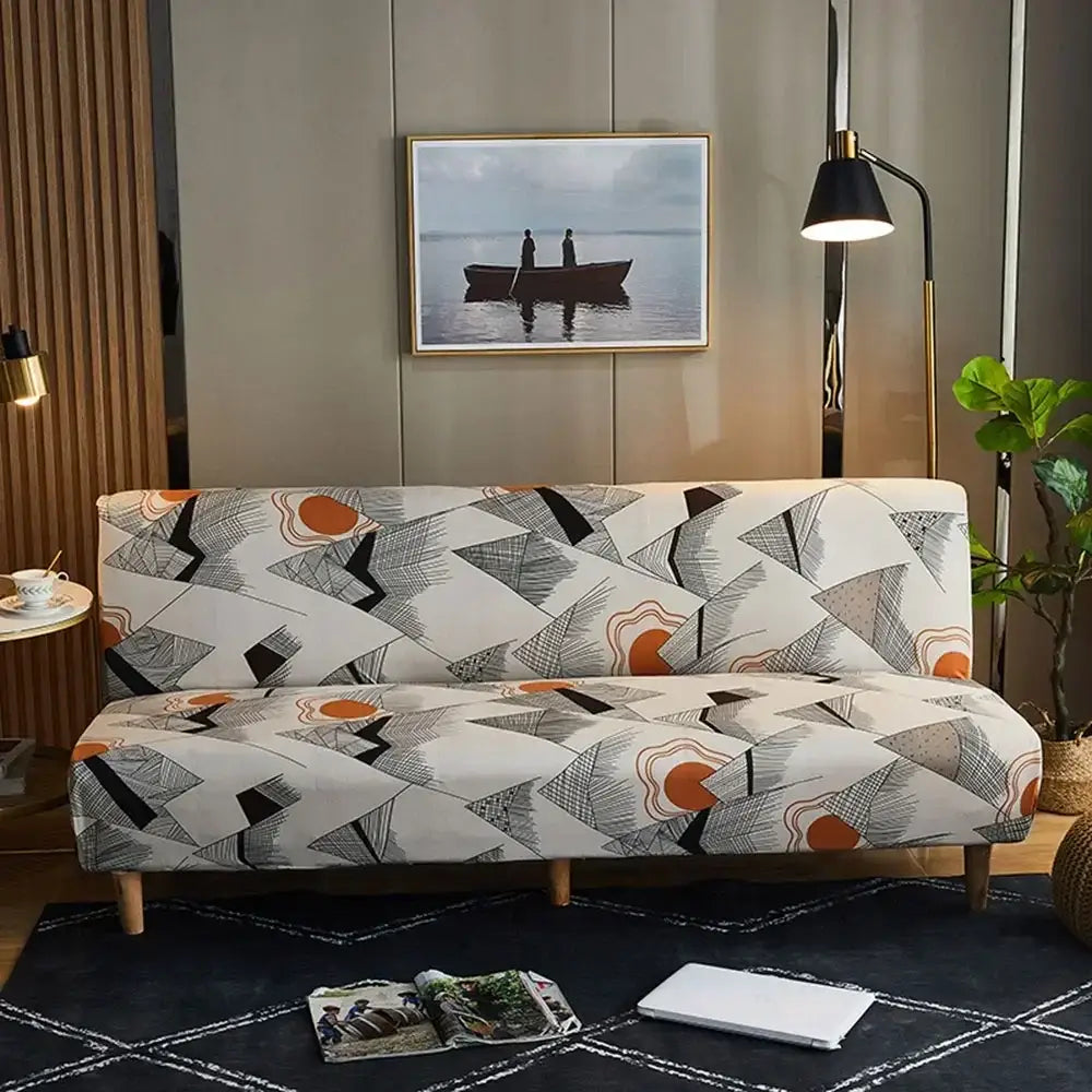 Modern geometric-patterned sofa cover in white black and orange tones with stretchy fabric for decorbites bohemian mandala futon