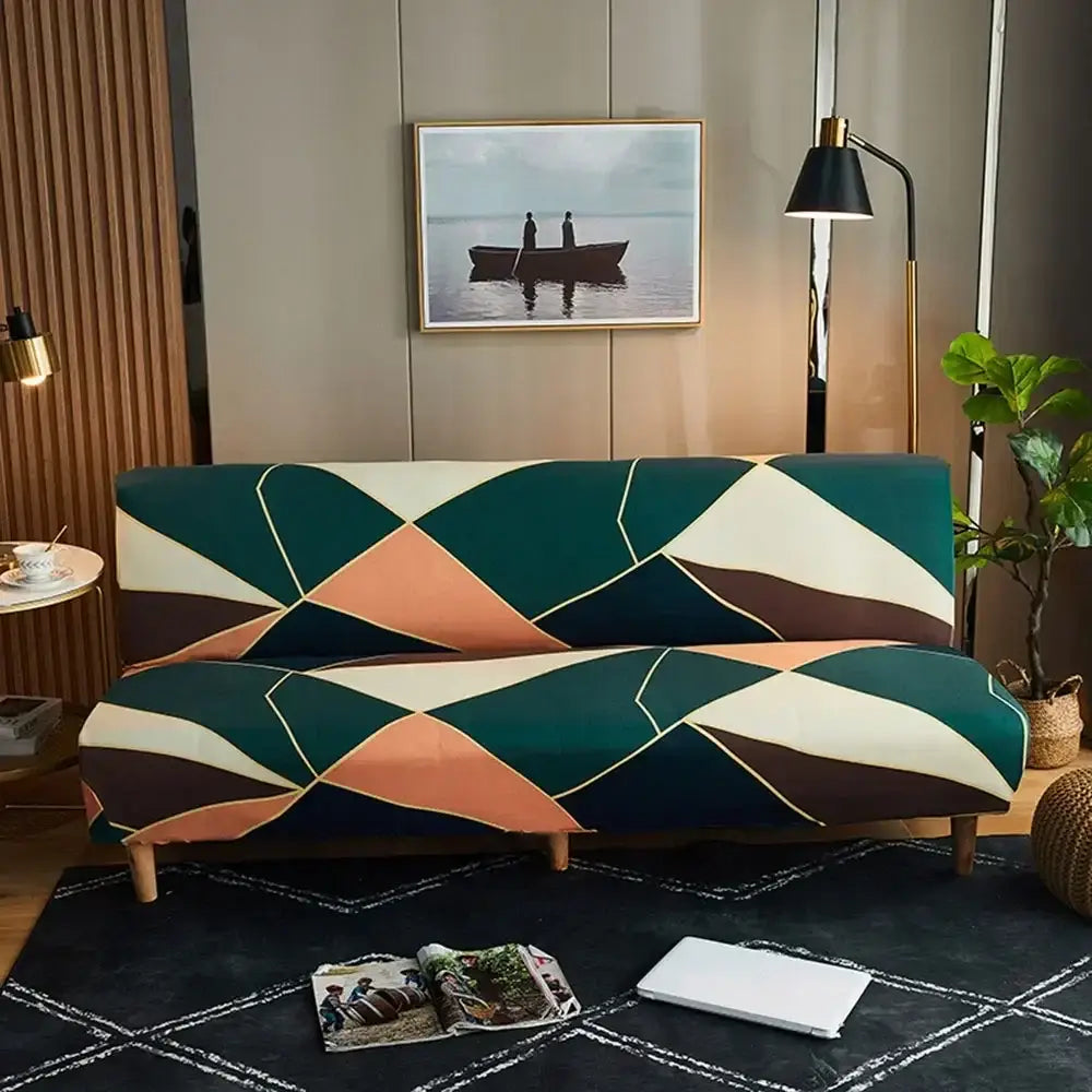 A modern sofa draped in a decorbites bohemian mandala sofa cover with teal terracotta cream geometric patterns