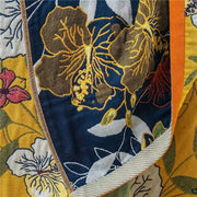 Navy blue cotton gauze cat bath towel featuring intricate gold hibiscus embroidery with yellow and orange accents decorbites cat bath