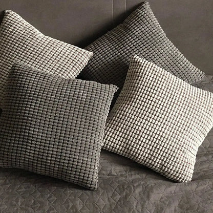 Four square gray textured corn grain cushion covers with raised grid pattern from decorbites corduroy corn collection