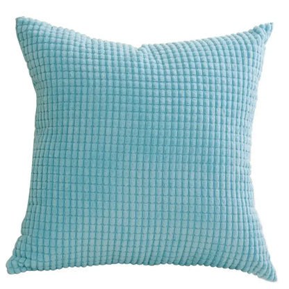 A soft light blue cushion cover with textured waffle weave fabric from decorbites corduroy corn grain set