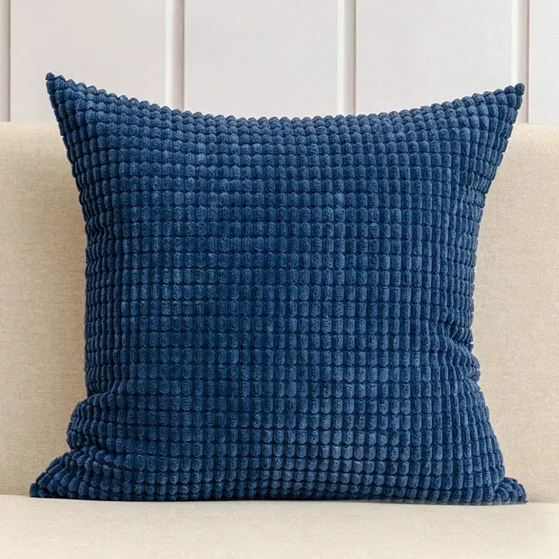 Deep blue corduroy throw pillow with textured ribbed surface in navy charcoal corduroy corn grain cushion cover decorbites