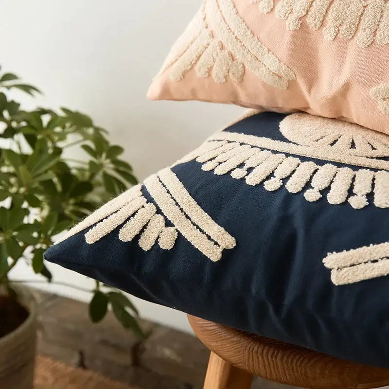 Navy and cream embroidered cotton pillow cover featuring textured sunburst decorbites embroidery for living room decor