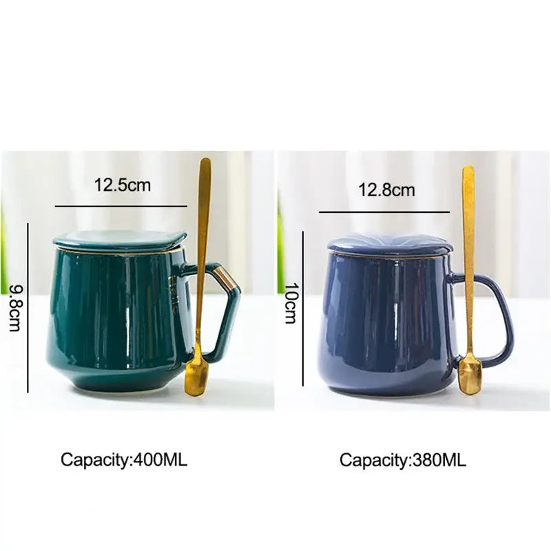 Navy and emerald ceramic mug set with lids and gold spoons featuring deep teal and navy blue ceramic mugs