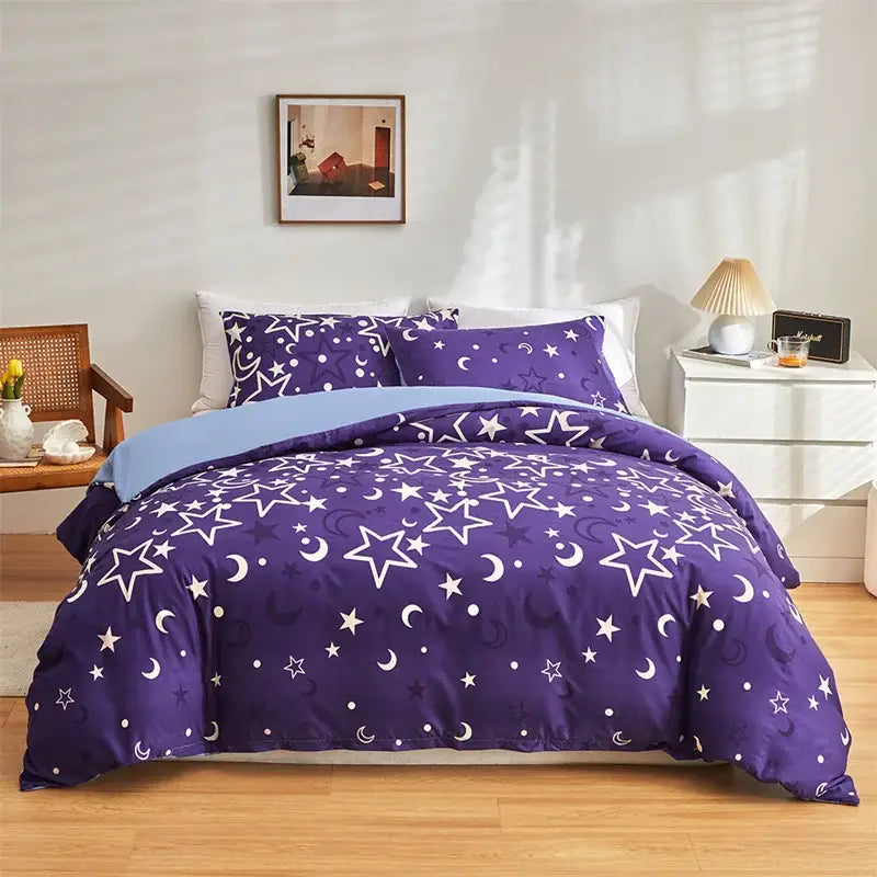 Purple star and moon patterned duvet set with light blue lining for decorbites cosmos luminous bedding set