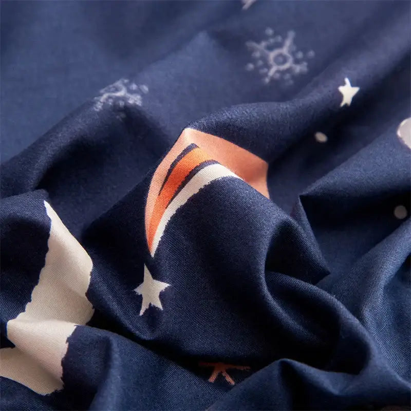 Navy space planet bedding set with whimsical white stars orange comet trails and subtle sun patterns for decorbites cosmos luminous
