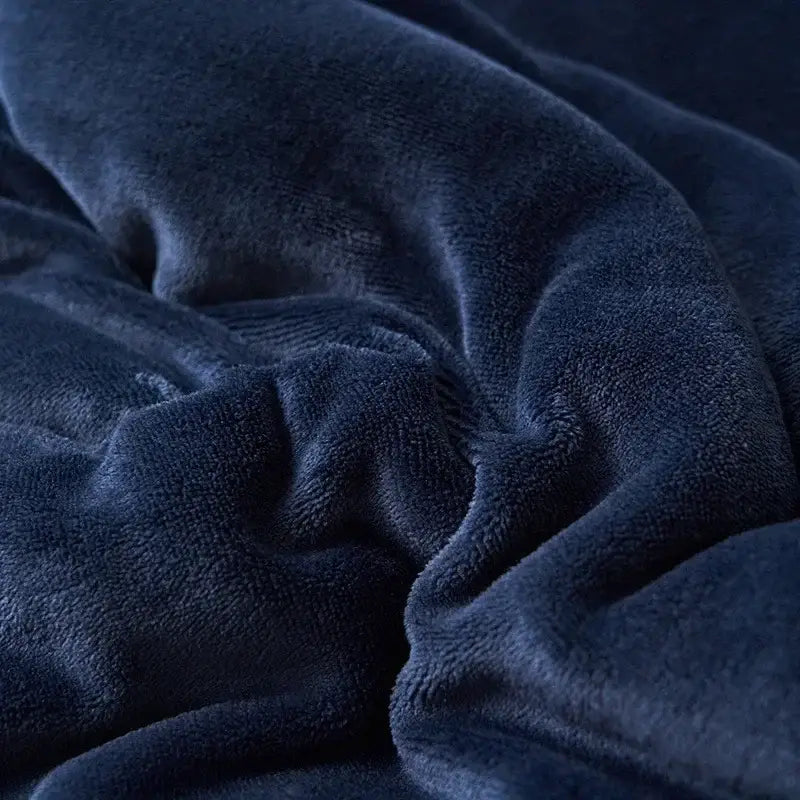 Deep navy blue double layer queen blanket with soft textured fleece surface in plush sherpa comfort design