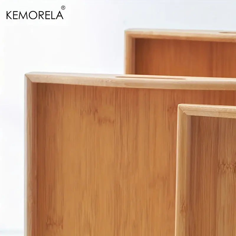 Nested light brown rectangular wooden trays with natural wood grain finish for kitchen storage organizer
