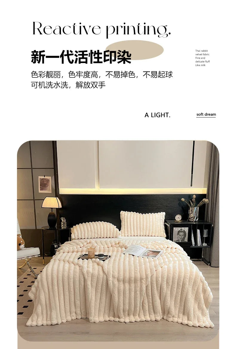 Cream-colored plush ribbed knit blanket with pom-pom trim made from soft coral fleece and bamboo fiber for autumn warmth