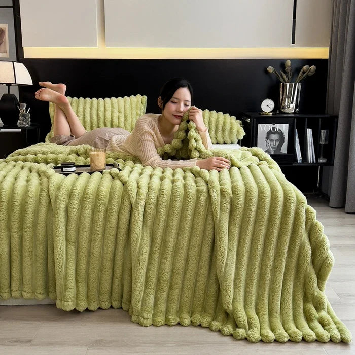 A plush lime green ribbed throw blanket made of soft coral fleece and bamboo fiber for autumn warmth and comfort