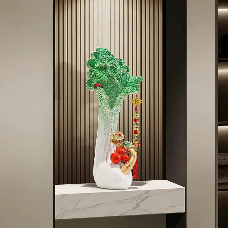 White ceramic decorbites cabbage ornament with green leafy top gold accents and red cherry details for office decor