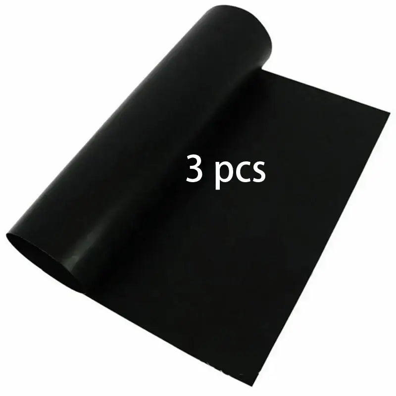 Black smooth-surfaced non-stick bbq grill mat made of flexible material for kitchen and outdoor cooking use
