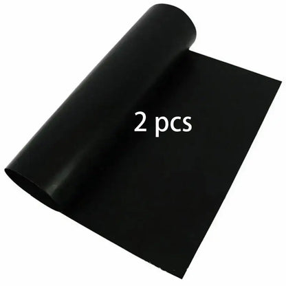 Black smooth-surfaced non-stick bbq grill mat roll made of flexible material for kitchen and outdoor cooking accessory