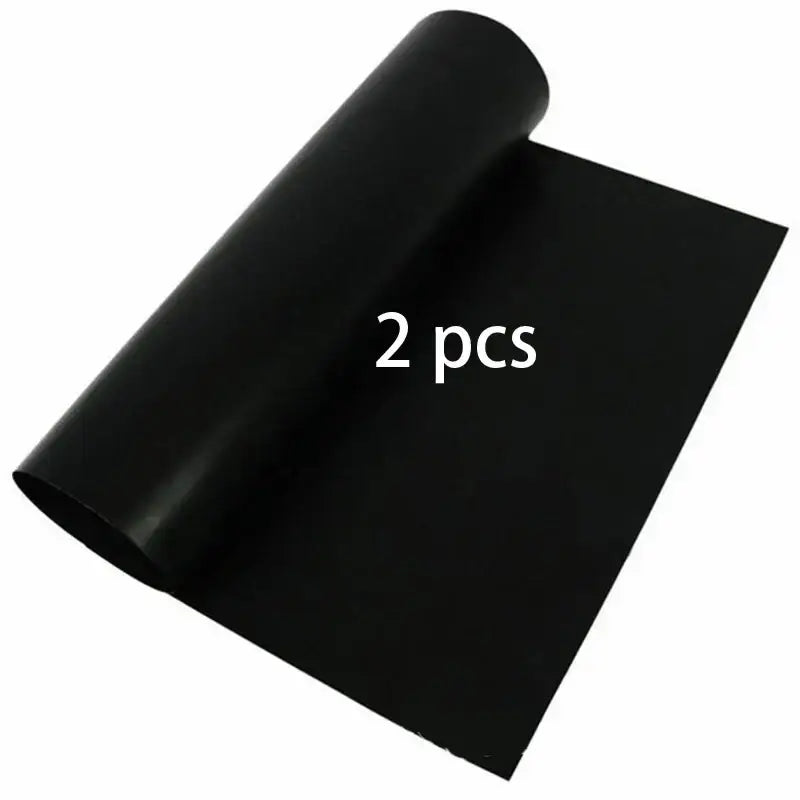 Black smooth-surfaced non-stick bbq grill mat roll made of flexible material for kitchen and outdoor cooking accessory