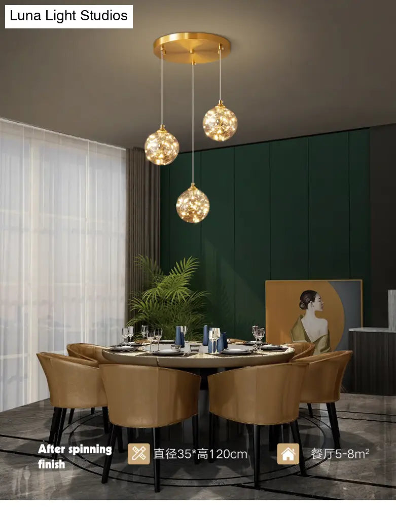 Nordic Amber Glass LED Pendant Lamp with Brass Finish and Starry Design for Bedroom