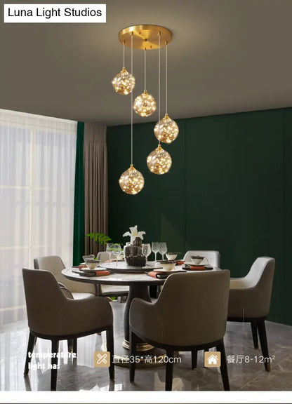 Nordic Amber Glass LED Pendant Lamp with Brass Finish and Starry Design for Bedroom