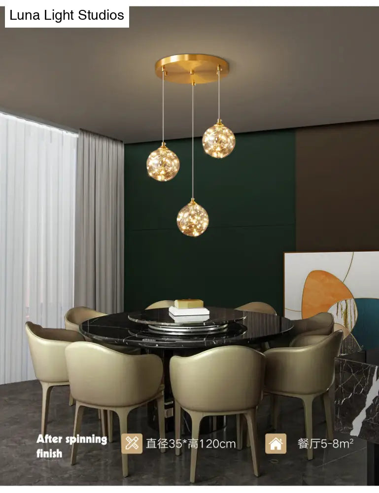 Nordic Amber Glass LED Pendant Lamp with Brass Finish and Starry Design for Bedroom