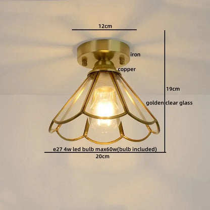 Brass-finished ceiling light with copper led base and golden glass panels in a petal design for bedroom use