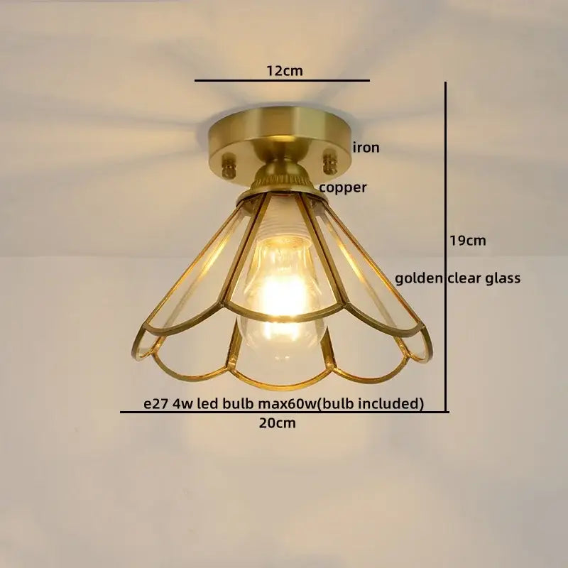 Brass-finished ceiling light with copper led base and golden glass panels in a petal design for bedroom use