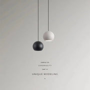 Nordic Ball Pendant Light in Black or White Aluminum - Decorbites