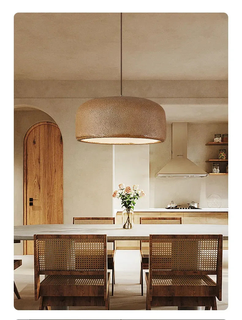 Textured beige woven basket-like nordic bar wabi sabi led pendant lamp hanging above dining table