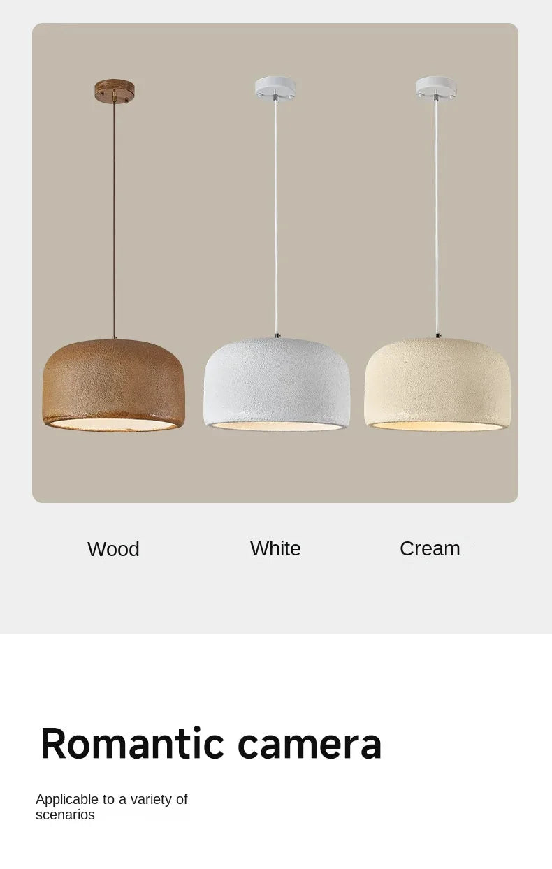 Three textured dome-shaped led pendant lamps in wood white and cream finishes for bar or restaurant lighting