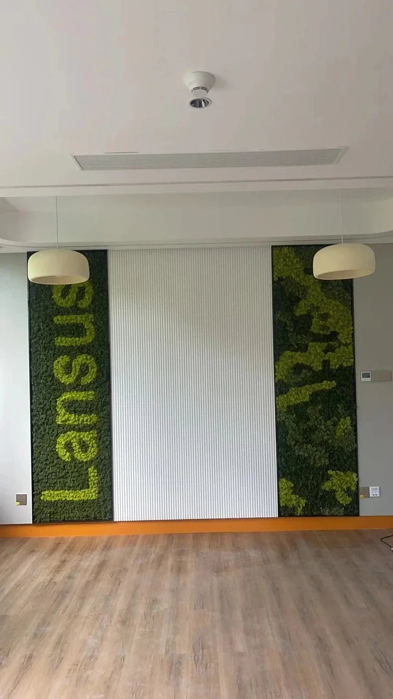 Green moss wall art with bold vertical lansus lettering paired with nordic bar wabi sabi led pendant lamp