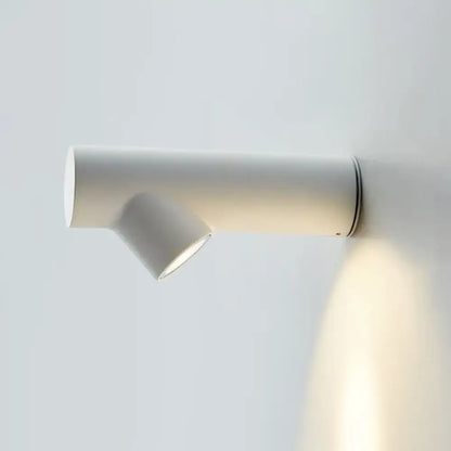Minimalist white cylindrical wall-mounted spotlight featuring adjustable led light type and sleek fixture height design for bedrooms