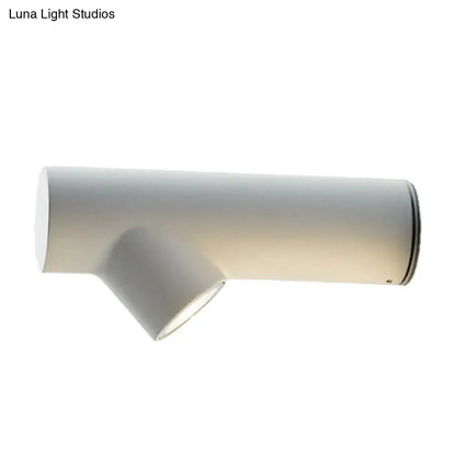 Nordic black adjustable led wall lamp with white cylindrical fixture and black accent ring for bedroom spotlight lighting