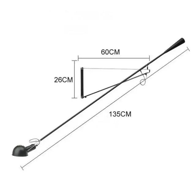 Black metal wall lamp with adjustable long arm and spherical shade designed as a Nordic bedroom light