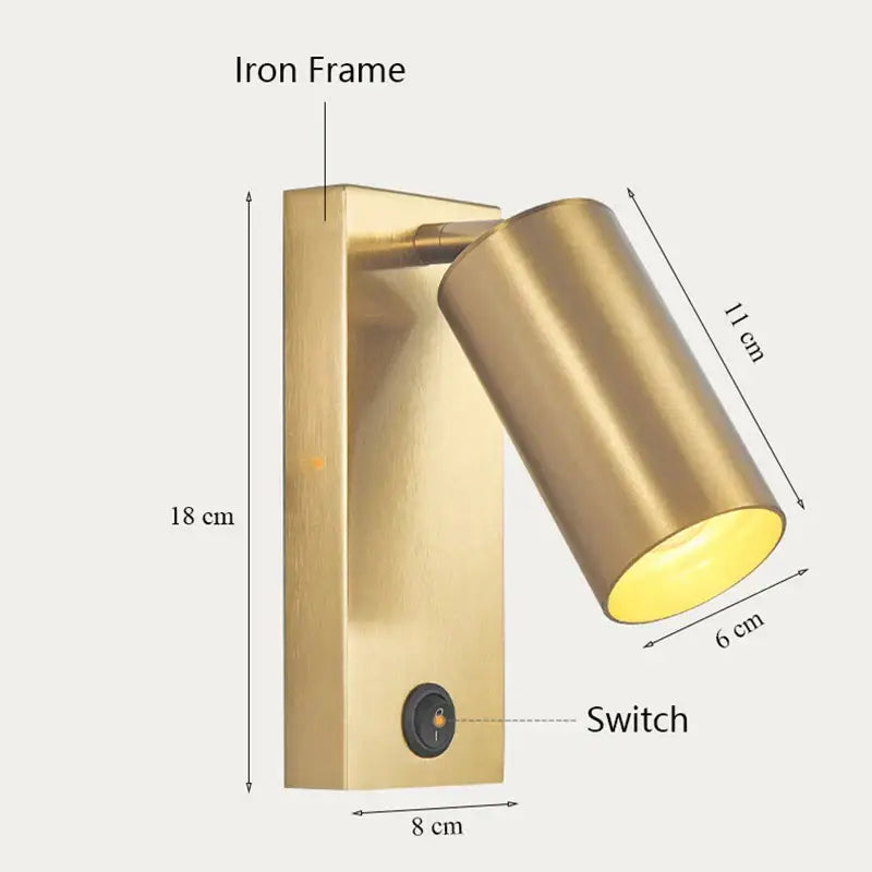 Nordic black brass wall sconce with brass-finished cylindrical spotlight and iron frame wall lamp for bedroom decorbites black brass