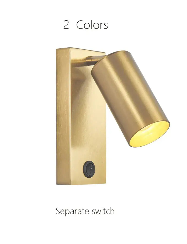 Nordic black brass wall sconce with brass-finished cylinder spotlight and rectangular base for bedroom wall lamp decorbites black brass