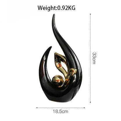 Black and gold glossy nordic ceramic figurine with flowing flame-like form for living room desk decor
