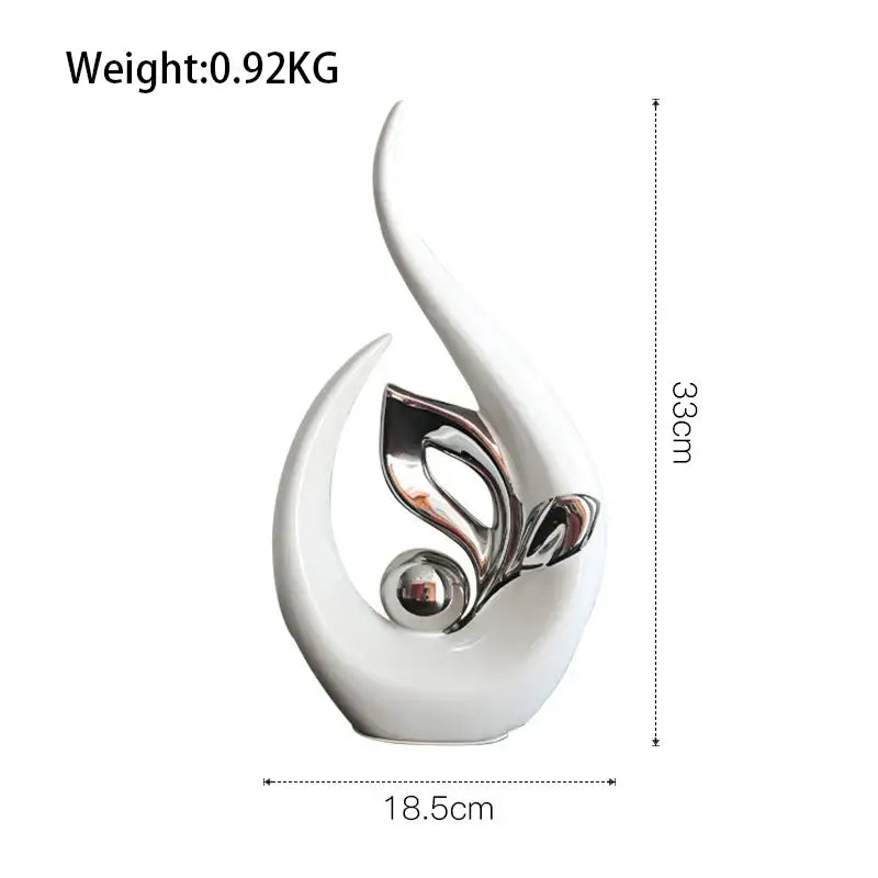 Elegant white nordic ceramic figurine with abstract leaf design and polished silver elements for living room decor