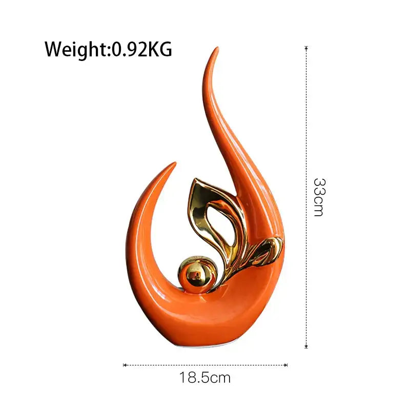 Vibrant orange nordic ceramic figurine with gold accents and glossy finish featuring abstract flame curves for decor