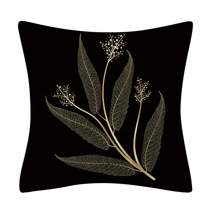 Black cushion with elegant golden leaves pillow design featuring gold leaf and branch for living room decor