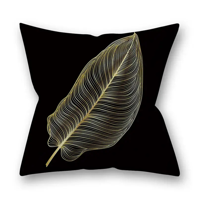Black throw pillow featuring delicate gold leaf design with fine line art for nordic golden leaves pillow decor