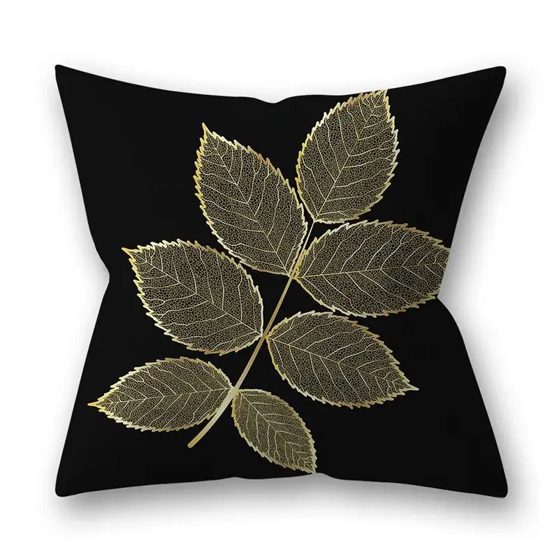 Black throw pillow with intricate gold leaf design featuring detailed vein patterns for golden leaves pillow cases decor