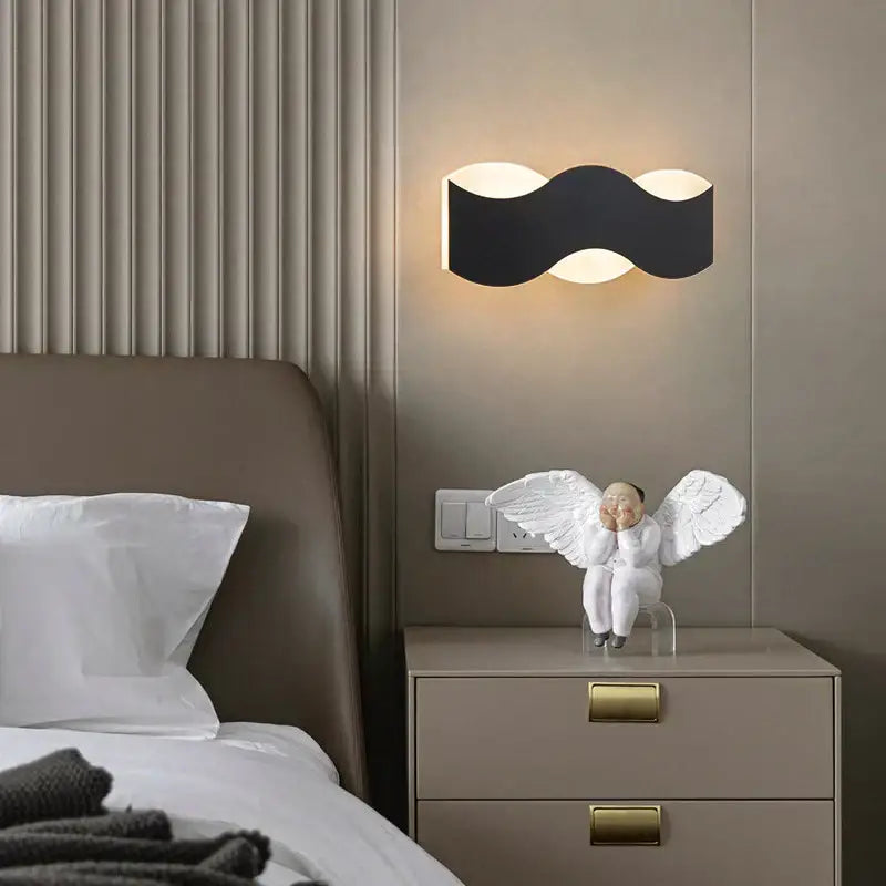 Black wavy led wave wall light with warm ambient lighting for bedroom decorbites led wave sculptural decor