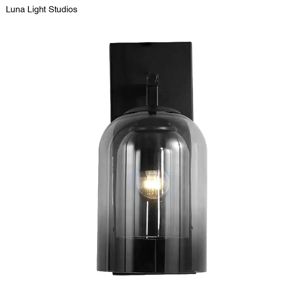 Nordic black wall lamp with matte finish and ribbed smoked glass dome shade housing an exposed bulb for bedroom use