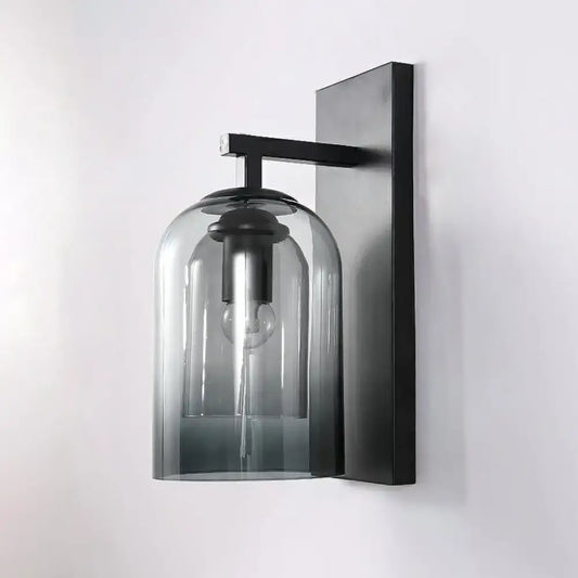 Nordic black metal wall lamp with smoked glass dome and exposed bulb designed as a bedroom sconce