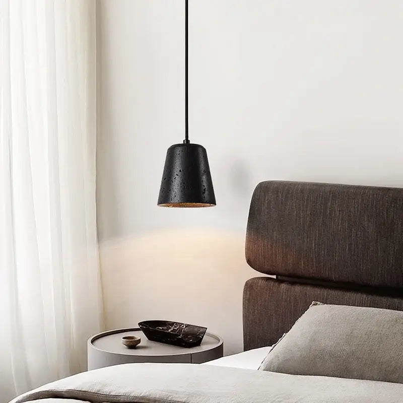 Black travertine pendant light with textured matte finish and warm led interior for dining room decorbites black travertine