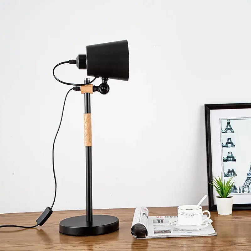 Black metal desk lamp with wooden accent band and adjustable gooseneck design from decorbites adjustable desk lamp collection